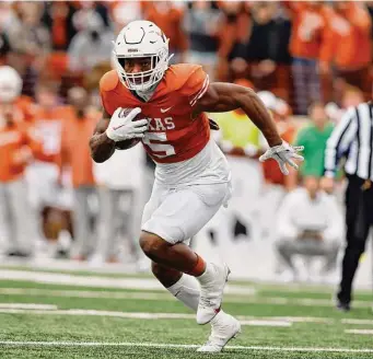  ?? Icon Sportswire via Getty Images ?? While running backs are rarely taken in the first round of the NFL draft anymore, former Longhorn Bijan Robinson has the type of electric ability that could tempt the Cowboys.