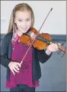  ??  ?? Cerys Denholme, winner of violin solos Scots beginners.