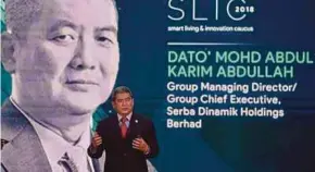  ?? BERNAMA PIC ?? Serba Dinamik Holdings Bhd group chief executive officer Datuk Mohd Abdul Karim Abdullahf presenting a paper at the Smart Living &amp; Innovation Caucus conference in Kuala Lumpur yesterday.