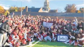  ?? KEITH GROLLER/THE MORNING CALL ?? The Muhlenberg football team celebrates on the field at Scotty Wood Stadium after a 55-0 win over Moravian gave the Mules the Centennial League title and an automatic berth to the NCAA Division III tournament.