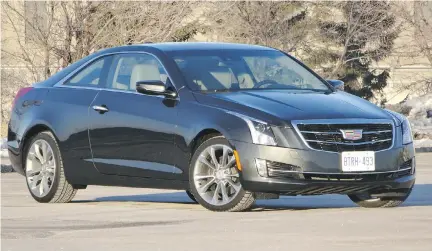  ?? D AV I D B O O T H / D R I V I NG ?? The comely Cadillac ATS 2.0- L Turbo Performanc­e AWD Coupe is 0.3 seconds faster to 100 km/ h than BMW’s AWD 428i.