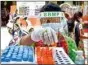  ?? PTI ?? A health worker sorts swab samples for COVID-19 testing, in Bengaluru, on Saturday