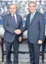  ?? APP ?? Foreign Minister Shah Mehmood Qureshi welcomes his Turkish counterpar­t Mevlut Cavusoglu at the Ministry of Foreign Affairs in Islamabad. —