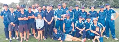  ?? ?? The Levin Old Boys team, pictured at Whanganui with their supporters after winning the Coastal Challenge Cup final at Victoria Park.