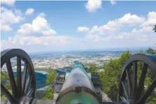  ?? STAFF FILE PHOTO BY OLIVIA ROSS ?? Memorial cannons overlook the city of Chattanoog­a at Point Park on Lookout Mountain. The park's entrance fee will be waived April 22, the first day of National Park Week. Rangers will lead programs at 11 a.m., 2 and 4 p.m.