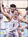  ?? Andy Lyons / Getty Images ?? Gonzaga’s Jalen Suggs (1) celebrates with teammates after making the winning 3-pointer in overtime to defeat UCLA 93-90 in the Final Four on Saturday at Lucas Oil Stadium in Indianapol­is.