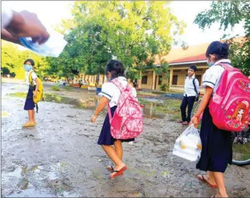  ??  ?? Hygienic supplies such as soap, sanitisers, alcohol and thermomete­rs will be handed out at 417 schools in five provinces and Phnom Penh.