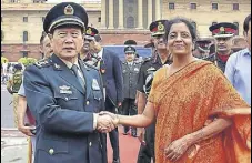  ?? AJAY AGGARWAL/HT ?? Defence minister Nirmala Sitharaman greets her Chinese counterpar­t General Wei Fenghe in New Delhi on Thursday.