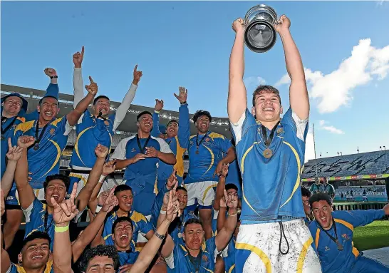  ?? GETTY IMAGES ?? Niko Jones and his St Peter’s College team-mates celebrate winning the Auckland 1A title earlier this year.