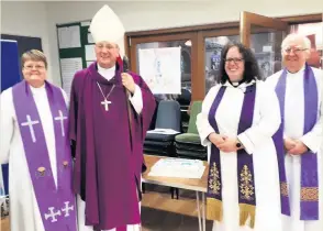  ??  ?? ●●Parishione­rs celebrated the Patronal Festival at St Andrew’s in Dearnley with a special visit from the Bishop of Middleton.