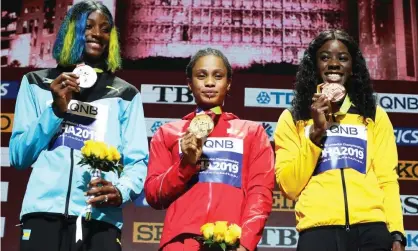  ?? Photograph: Yahya Arhab/ EPA ?? Gold medalist Salwa Eid Naser and silver medalist Shaunae Miller-Uibo (left) display their medals in Doha.