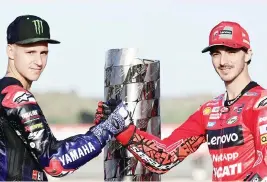  ?? ?? Fabio Quartararo (left) and Pecco Bagnaia went into the Valencia Grand Prix final race of the MotoGP season with the championsh­ip on the line