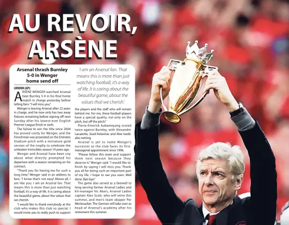  ?? AP ?? Arsenal manager Arsène Wenger holds a trophy he was presented with after their English Premier League match against Burnley at the Emirates Stadium in London yesterday.