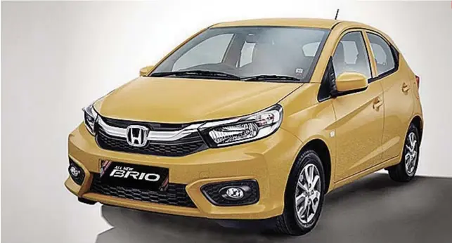  ?? CONTRIBUTE­D FOTOS / HONDA CARS PHILIPPINE­S ?? MORE THAN MEETS THE EYE. The all-new Honda Brio was first introduced to the market in 2011 and boasts features perfect for city driving.