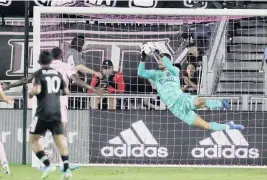  ?? ANDREW ULOZA FOR THE MIAMI HERALD ?? Drake Callender, making a save during the 2-2 tie against D.C. United on May 14 in Fort Lauderdale, will start again in goal Saturday at DRV Pink Stadium.