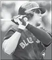  ?? Fred Thornill, Reuters ?? Colby Rasmus hits a two-run homer in the fifth inning Sunday to help power the Jays to victory.