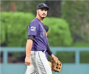  ?? ERIC HARTLINE/USA TODAY SPORTS ?? Rockies’ five-time Gold Glove third baseman Nolan Arenado went into Sunday tied for the NL lead in home runs with 20.