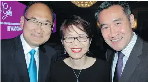  ??  ?? Liberal MLAs John Yap, Teresa Wat and Michael Lee were among a gaggle of politicos on hand at the Fairmont Waterfront Hotel to commemorat­e the one-country, two-systems rule.