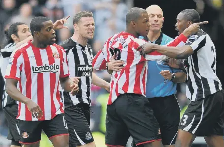  ??  ?? Kevin Nolan tries to get involved in a tussle between Sunderland’s Titus Bramble and Shola Ameobi in the 1-1 derby draw in January 2011.