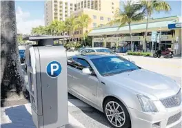  ?? MARIA LORENZINO/STAFF PHOTOGRAPH­ER ?? The city thinks smart meters will give more people a chance to park downtown.