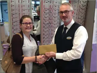 ??  ?? Pictured is Competitio­n Winner Amy Nally alongside Specsavers Drogheda Store Director David McCloskey