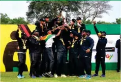  ?? ?? LET’S DO THE DANCE . . . Zimbabwe’s cricketers celebrate after thrashing Namibia to win gold in Accra, Ghana, yesterday. Picture: Team Zimbabwe PR