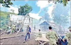  ?? ENVIRONMEN­T MINISTRY ?? Rangers destroy over 20 charcoal kilns and huts in Kampong Speu province’s Oral district on Tuesday.