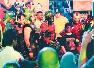  ?? (Ali al-Qarni/Reuters) ?? PARTICIPAN­TS ATTEND the Comic Con expo in Jeddah on Saturday. Objections by religious conservati­ves who likened the event to ‘devil worship’ appeared to have had little effect.