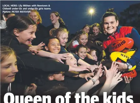  ??  ?? LOCAL HERO: Lily Mithen with Newtown & Chilwell under-12s and under-15s girls teams. Picture: PETER RISTEVSKI