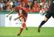  ?? REUTERS ?? Liverpool's Philippe Coutinho unleashes a shot during the Reds’ 2-1 victory over Leicester City in Hong Kong on Saturday.