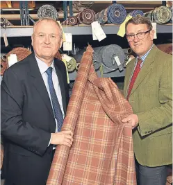  ?? Blair Macnaughto­n, left, and James Dracup with some of the company’s products. ??