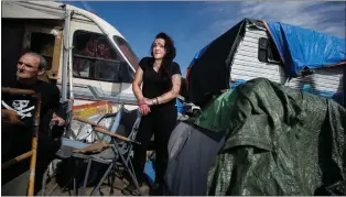  ?? DAI SUGANO — STAFF PHOTOGRAPH­ER ?? Mariena Acosta, who lives in a tent at the homeless encampment near Columbus Park in San Jose, says she stayed in a tiny home shelter for six months but was unable to locate permanent housing.