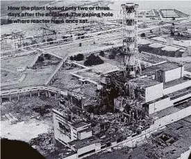  ?? How the plant looked only two or three days after the accident. The gaping hole is where reactor No. 4 once sat. ??