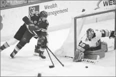  ?? ANDY CLAYTON-KING/AP ?? VEGAS GOLDEN KNIGHTS GOALTENDER MARC-ANDRE FLEURY (29) stops a shot by Minnesota Wild left wing Marcus Foligno (17) in the first period of a game Wednesday in St. Paul, Minn.