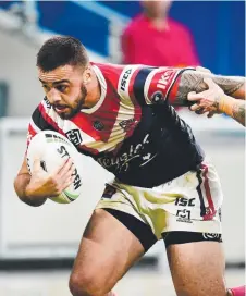  ?? Picture: ALIX SWEENEY ?? Roosters winger Matt Ikuvalu scored five tries against the Cowboys at QBS Stadium.