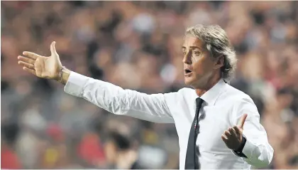  ?? Picture: AFP ?? MR FIX-IT. Italian coach Roberto Mancini has built some solid foundation­s to take his team into the future.