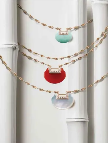  ??  ?? The Yu Yi collection is now available with lock-shaped pendants in jadeite, red agate and mother-of-pearl