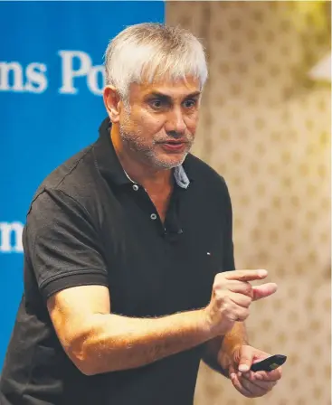  ?? Picture: BRENDAN RADKE ?? POSITIVE: Real Estate coach Tom Panos addresses attendees at the Reef Hotel Casino as part of the Cairns Post’s real estate seminar.