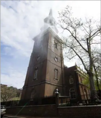  ?? MATT ROURKE — THE ASSOCIATED PRESS ?? The historic Christ Church test its fire suppressio­n system ahead of summer renovation­s in Philadelph­ia, Wednesday.