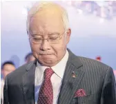  ??  ?? CLINGING ON: Malaysian Prime Minister Najib Razak is embroiled in scandal.