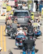  ?? STEPHEN M. DOWELL/STAFF PHOTOGRAPH­ER ?? Downtown Leesburg begins filling up with motorcycle­s on Friday as Bikefest gets started.