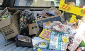  ??  ?? CONFISCATE­D: The expired goods, along with some which did not have an expiry date, were confiscate­d from the shops and collected to be destroyed