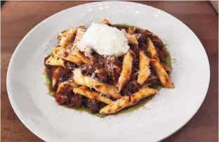  ?? RICHARD S. DARGAN/FOR THE JOURNAL ?? Lamb Ragu with homemade pasta, mint cheese. oil and a scoop of lemon ricotta