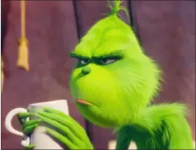  ?? ASSOCIATED PRESS ?? The character Grinch, voiced by Benedict Cumberbatc­h, in a scene from “The Grinch.”