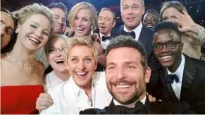  ??  ?? This selfie posted by ellen deGeneres, featuring a host of stars at the Oscars, went viral with more than 2.1 million retweets.