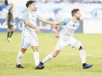  ??  ?? Bani Yas players celebrate after their victory over Dibba in an AGL match on Thursday.