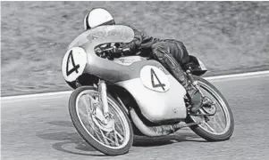  ??  ?? ABOVE: Ernst Degner on wee Suzuki with specific output of over 200bhp per litre – 50 years ago!