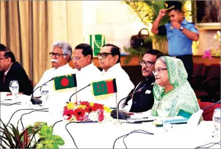  ?? AFP ?? Bangladesh premier Sheikh Hasina (first right) sits in a dialogue with opposition party in Dhaka on November 1. The country began campaignin­g on Monday for a year-end election.