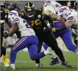  ?? DON WRIGHT — THE ASSOCIATED PRESS ?? Steelers nose tackle Javon Hargrave, center, blasts through the line of scrimmage in a game against Buffalo in December. Hargrave is the centerpiec­e of the Eagles’ offseason acquisitio­ns.