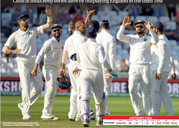 ?? AFP ?? The Indian team celebrates the fall of the last England wicket on Wednesday. —